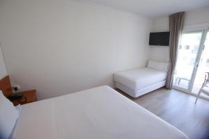Posteľ alebo postele v izbe v ubytovaní Solvi Hotel - Adults Only