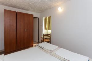 Postel nebo postele na pokoji v ubytování Lapad View Apartments