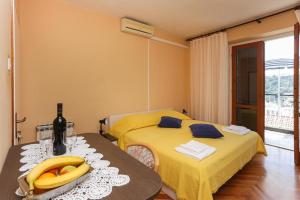 Postel nebo postele na pokoji v ubytování Lapad View Apartments