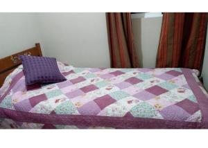 Postel nebo postele na pokoji v ubytování Casa el Tihue Puerto Varas + 4 fotografie