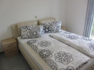 Postel nebo postele na pokoji v ubytování Apartment Tadić