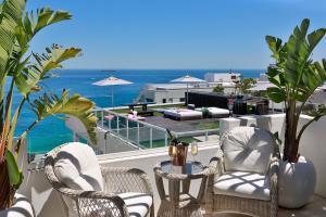 
A balcony or terrace at Clifton YOLO Spaces - Clifton Private Beach Villa
