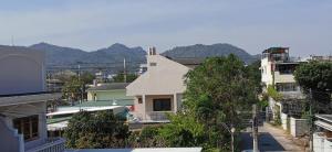 a view of a city with houses and trees at Bankaina in Hua Hin