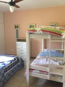 Katil atau katil-katil dalam bilik di Apart para até 6 Pessoas - PF