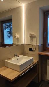 Fotografie z fotogalerie ubytování Guesthouse Rungg v destinaci Badia