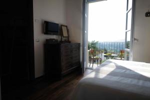 A bed or beds in a room at b&b cascina la cinciallegra