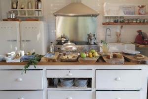 A kitchen or kitchenette at b&b cascina la cinciallegra