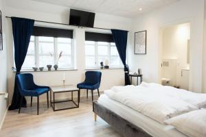 Postel nebo postele na pokoji v ubytování Hotelcity