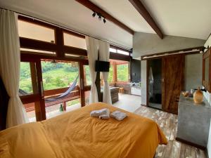 Cama ou camas em um quarto em I'Lumiar Loft
