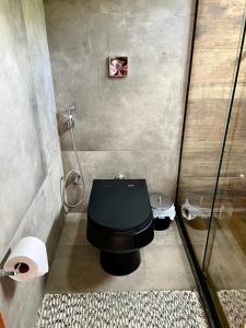 Um banheiro em I'Lumiar Loft