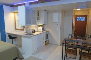 Кухня или мини-кухня в Apartments Tahko
