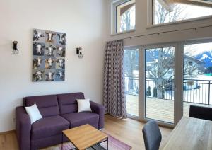 Ein Sitzbereich in der Unterkunft Appartements Blumenwiese