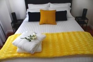 Tempat tidur dalam kamar di Ascot Road - discover Bowral