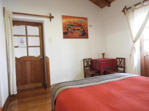 Voodi või voodid majutusasutuse Picaflor Tambo Guest House toas