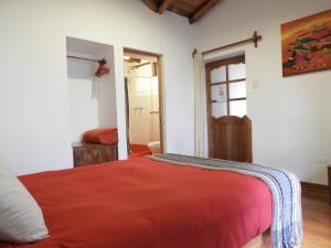 Voodi või voodid majutusasutuse Picaflor Tambo Guest House toas