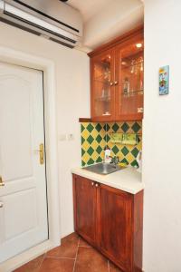 Kuchyň nebo kuchyňský kout v ubytování Apartments Jelena Skver
