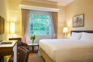 Letto o letti in una camera di Rendezvous Hotel Singapore by Far East Hospitality