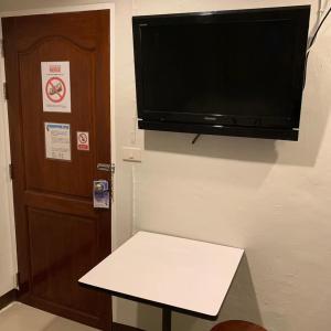 
A television and/or entertainment center at A-One Inn
