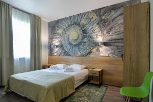 Postel nebo postele na pokoji v ubytování Отель "Белокуриха"