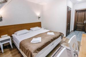 Ліжко або ліжка в номері Diamond Resort Black