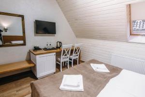 Ліжко або ліжка в номері Diamond Resort Black