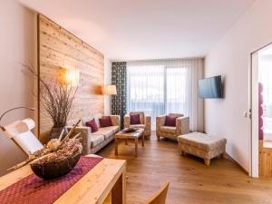 TV a/nebo společenská místnost v ubytování Narzissen Vital Resort Bad Aussee