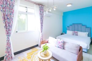 Een bed of bedden in een kamer bij 林居民宿