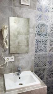 Ванна кімната в Guest House Shafran