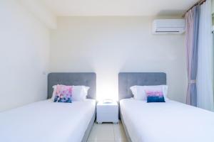 Een bed of bedden in een kamer bij 林居民宿
