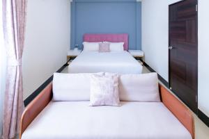 Een bed of bedden in een kamer bij 林居民宿