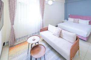 Een bed of bedden in een kamer bij 林居民宿