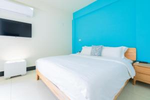 Een bed of bedden in een kamer bij 林居民宿