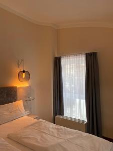 Postel nebo postele na pokoji v ubytování Safranberg Hotel & Sauna