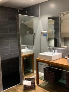 Koupelna v ubytování Hotel Les Embruns