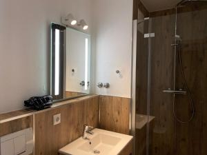 Koupelna v ubytování Safranberg Hotel & Sauna