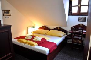 Posteľ alebo postele v izbe v ubytovaní Hotel St Florian