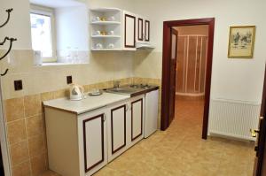 Kuchyňa alebo kuchynka v ubytovaní Hotel St Florian