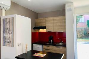Kuchyň nebo kuchyňský kout v ubytování Appartement 6 personnes Vue Mer