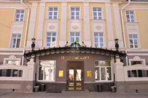 a store front of a building with a door at Hotel Ostrovskiy in Kostroma