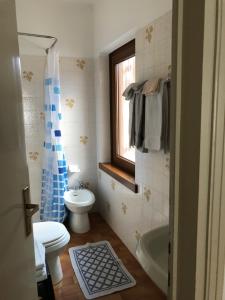 Ένα μπάνιο στο B&B Astor