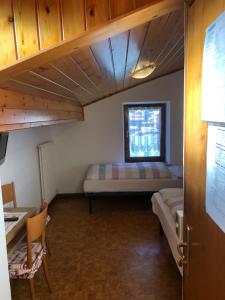 Postel nebo postele na pokoji v ubytování B&B Astor