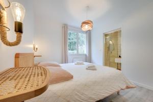 Giường trong phòng chung tại L'Episode Cevenol