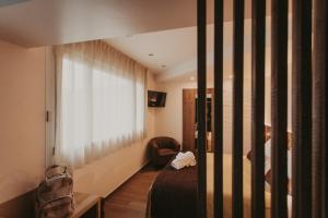Ein Sitzbereich in der Unterkunft La Trobada Hotel Boutique