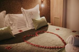 Ein Bett oder Betten in einem Zimmer der Unterkunft La Trobada Hotel Boutique