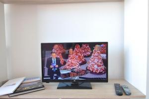 TV/Unterhaltungsangebot in der Unterkunft RNET - RHC 1410 Roses Holiday Center