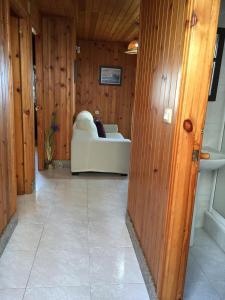 Televízia a/alebo spoločenská miestnosť v ubytovaní Bungalow 3 (adosado) - Playa Arnela