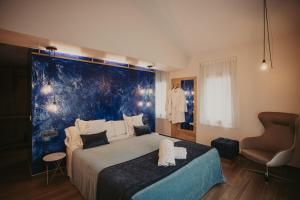 Ein Sitzbereich in der Unterkunft La Trobada Hotel Boutique