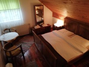 Ein Bett oder Betten in einem Zimmer der Unterkunft Guesthouse Arnika