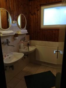A bathroom at Guesthouse Arnika