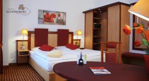 Postel nebo postele na pokoji v ubytování Hotel Schöneberg